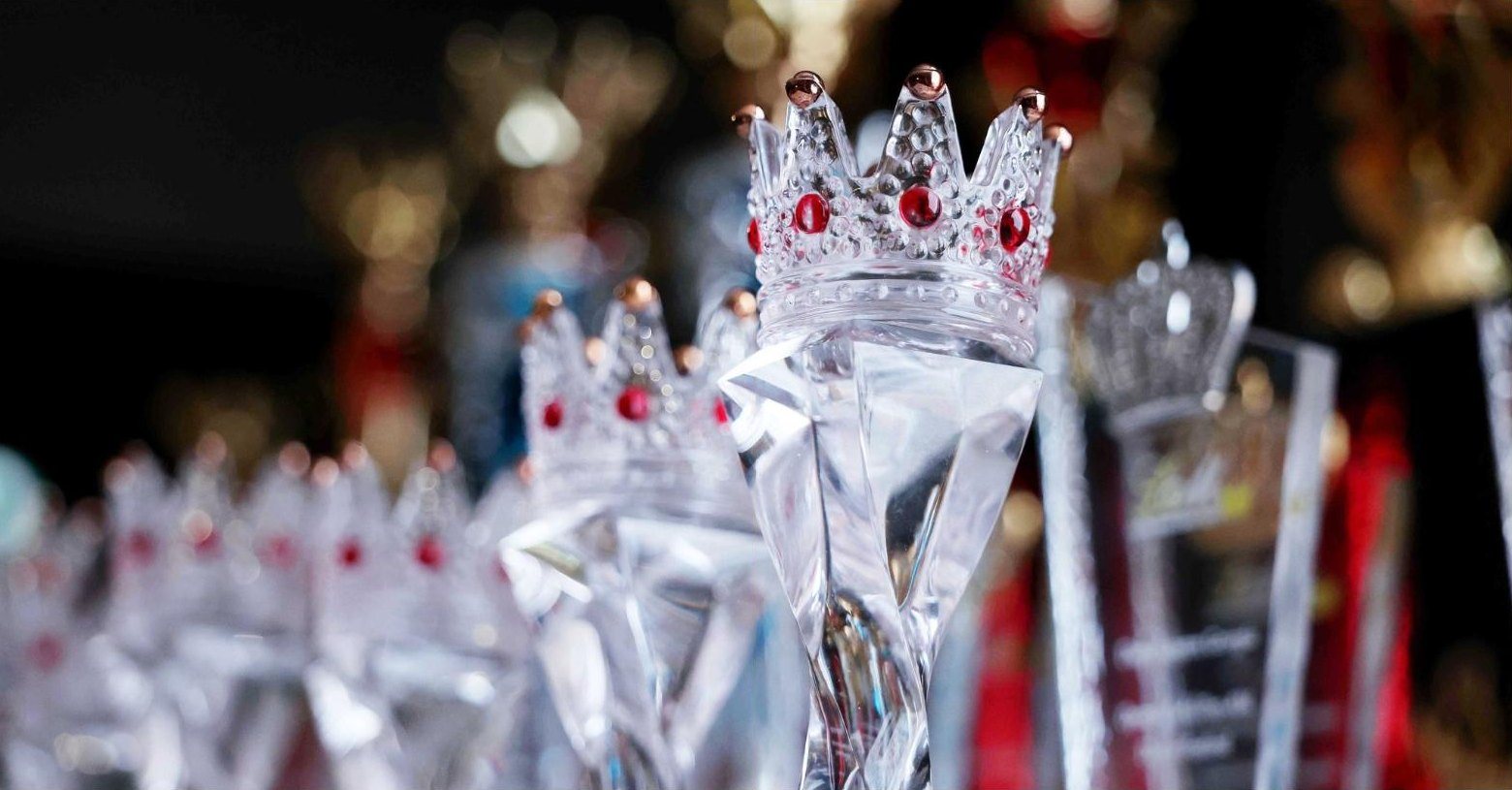 Crystal crown trophies set with red stones, awarded at Dance Queen Trophy 2026