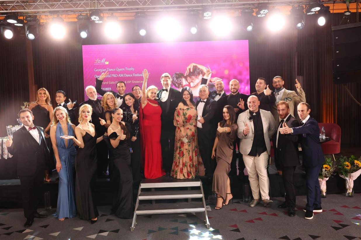 Guests, dancers and judges on stage at the close of the gala